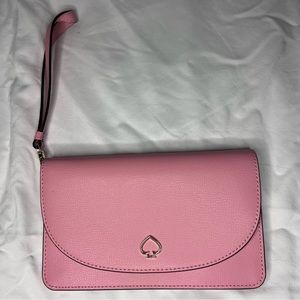 Kate Spade Pink Wristlet/Wallet. Like new. Only used once. Nonsmoking home